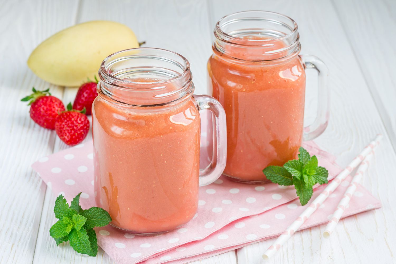 strawberry mango smoothies in glasses 
