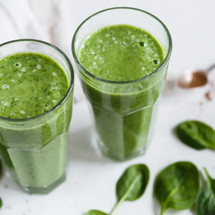 Two green smoothie in glasses